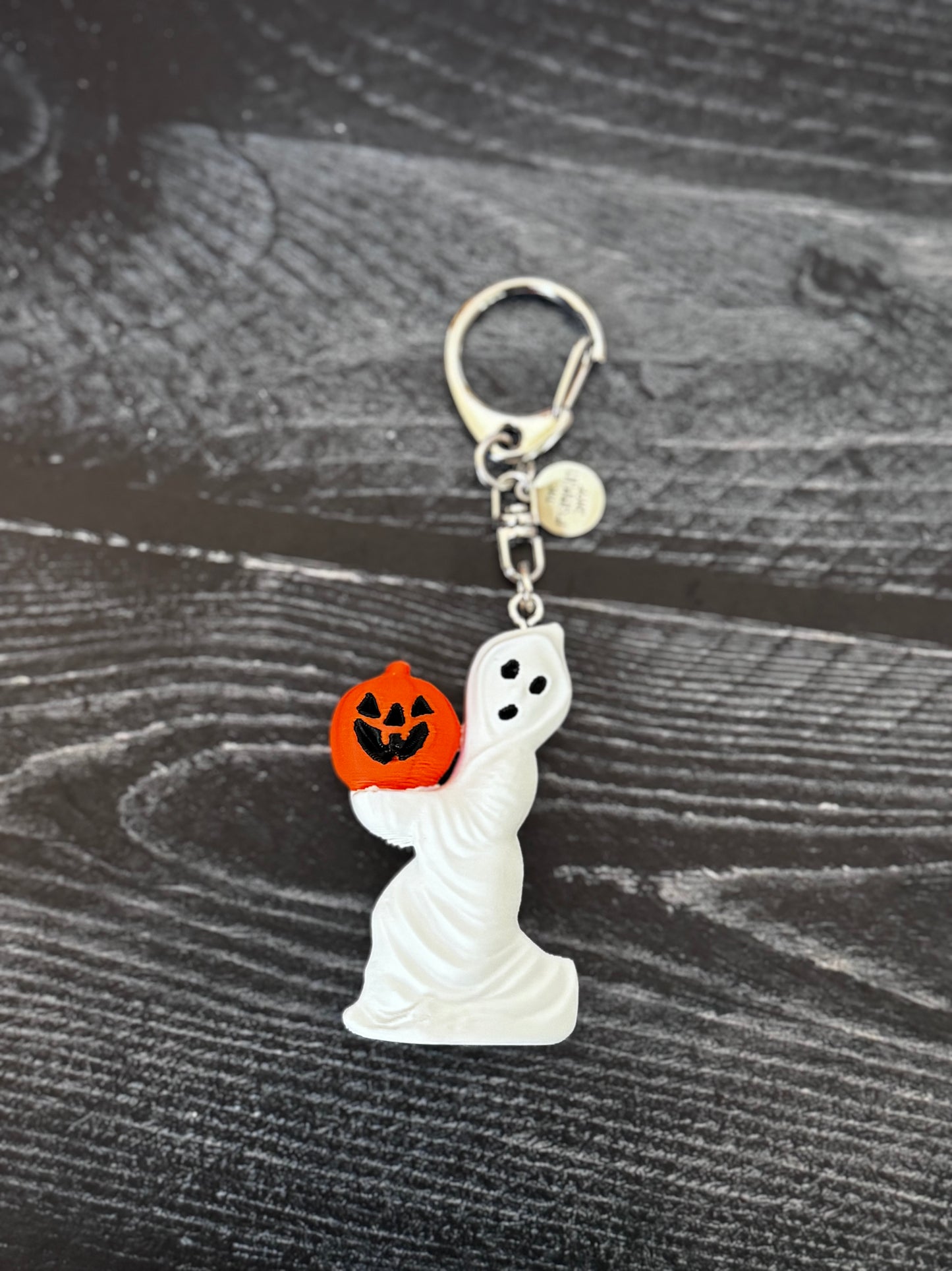 Vintage-Inspired Ghost Holding Jack-o-lantern Keychain