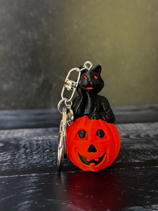 Vintage-Inspired Black Cat on Jack-O’-Lantern Keychain