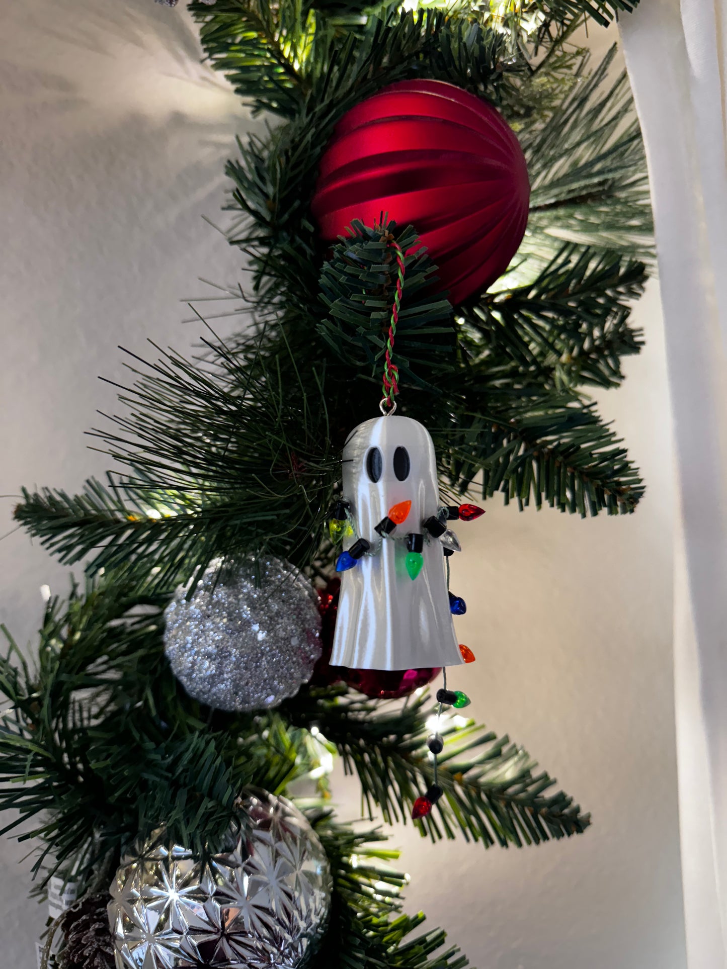 Spirit of Christmas Ornament with String Lights- Black Eyes