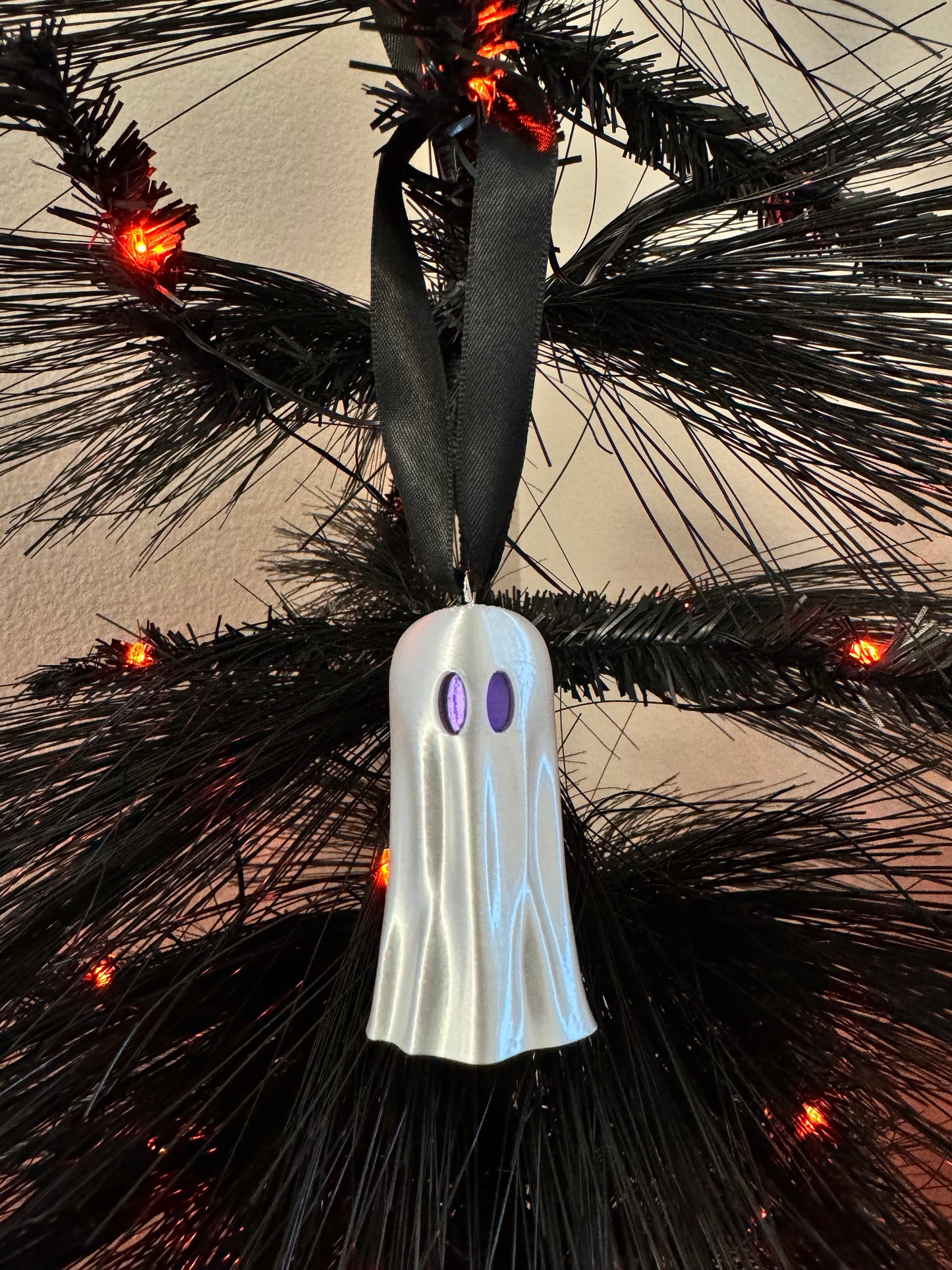 Spirit of Christmas Ornament - Purple Eyes
